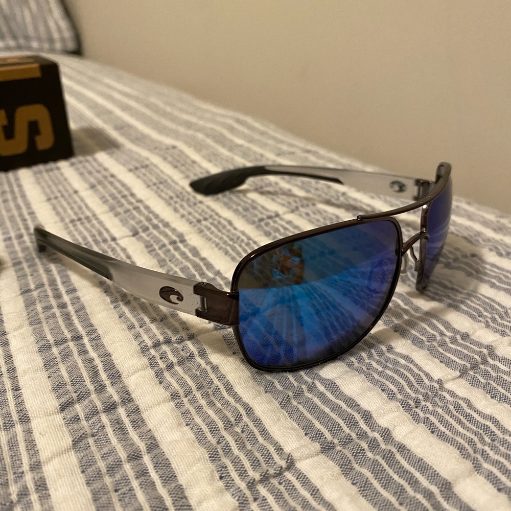 Costas 06S4011 cocos gunmetal blue mirror 580 G retail at $298